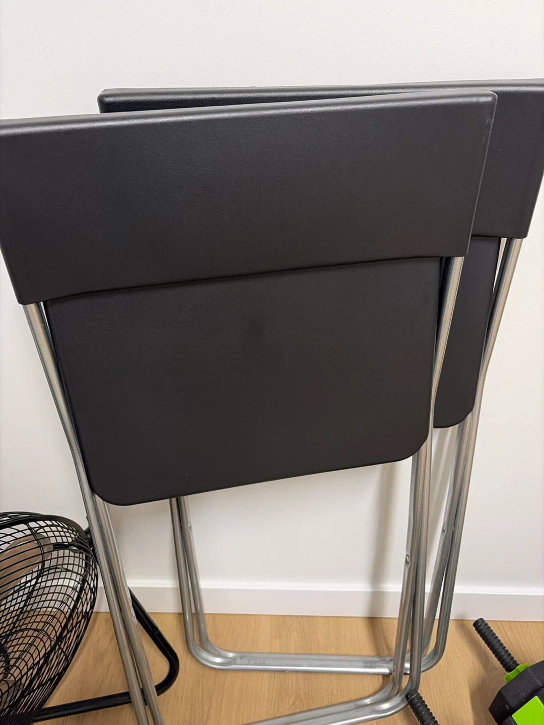 Two Black Folding Chairs