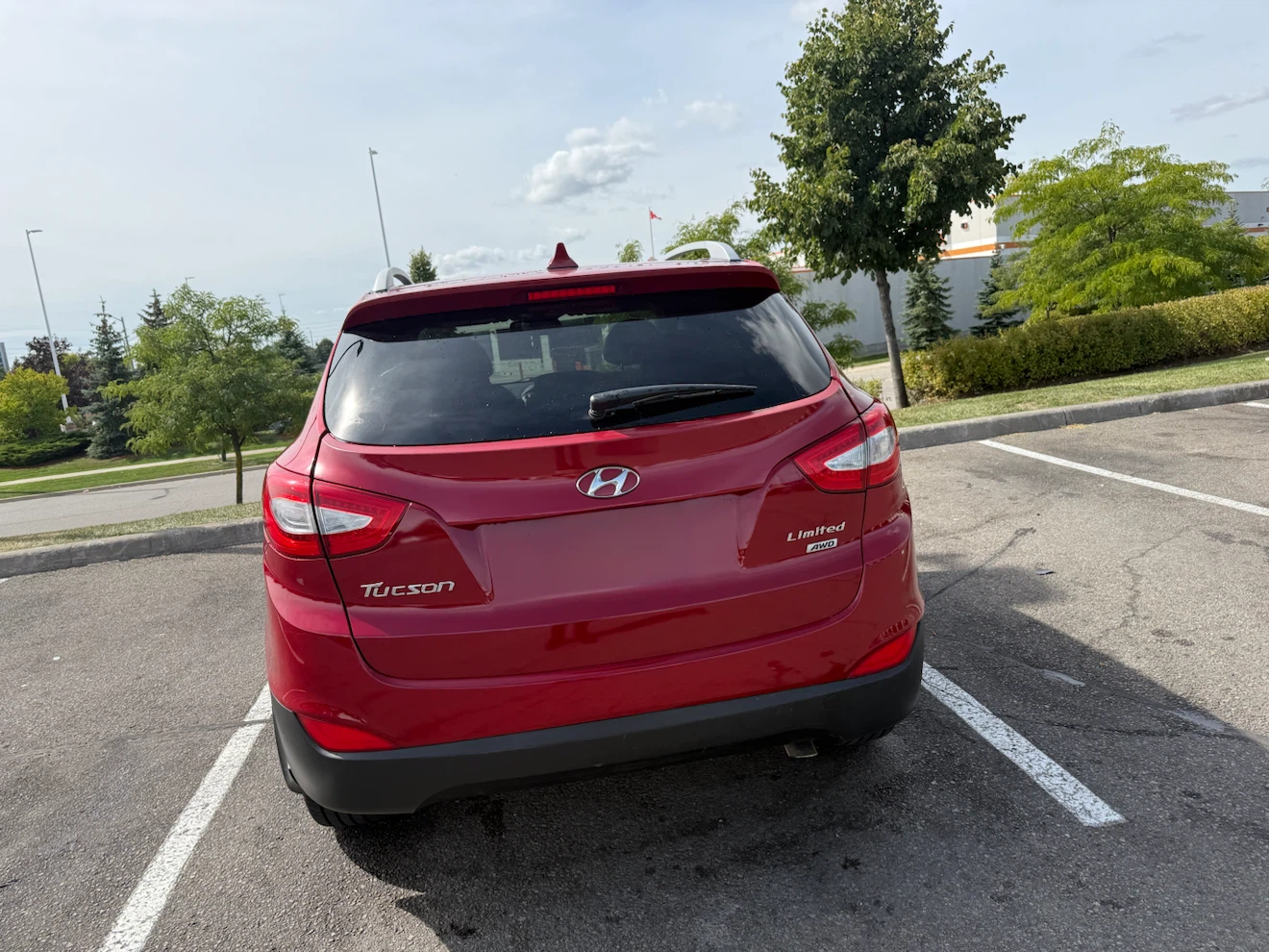 Red Hyundai Tucson Limited AWD comes with safety