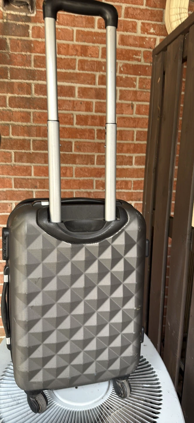 Spinner carry on suitcase