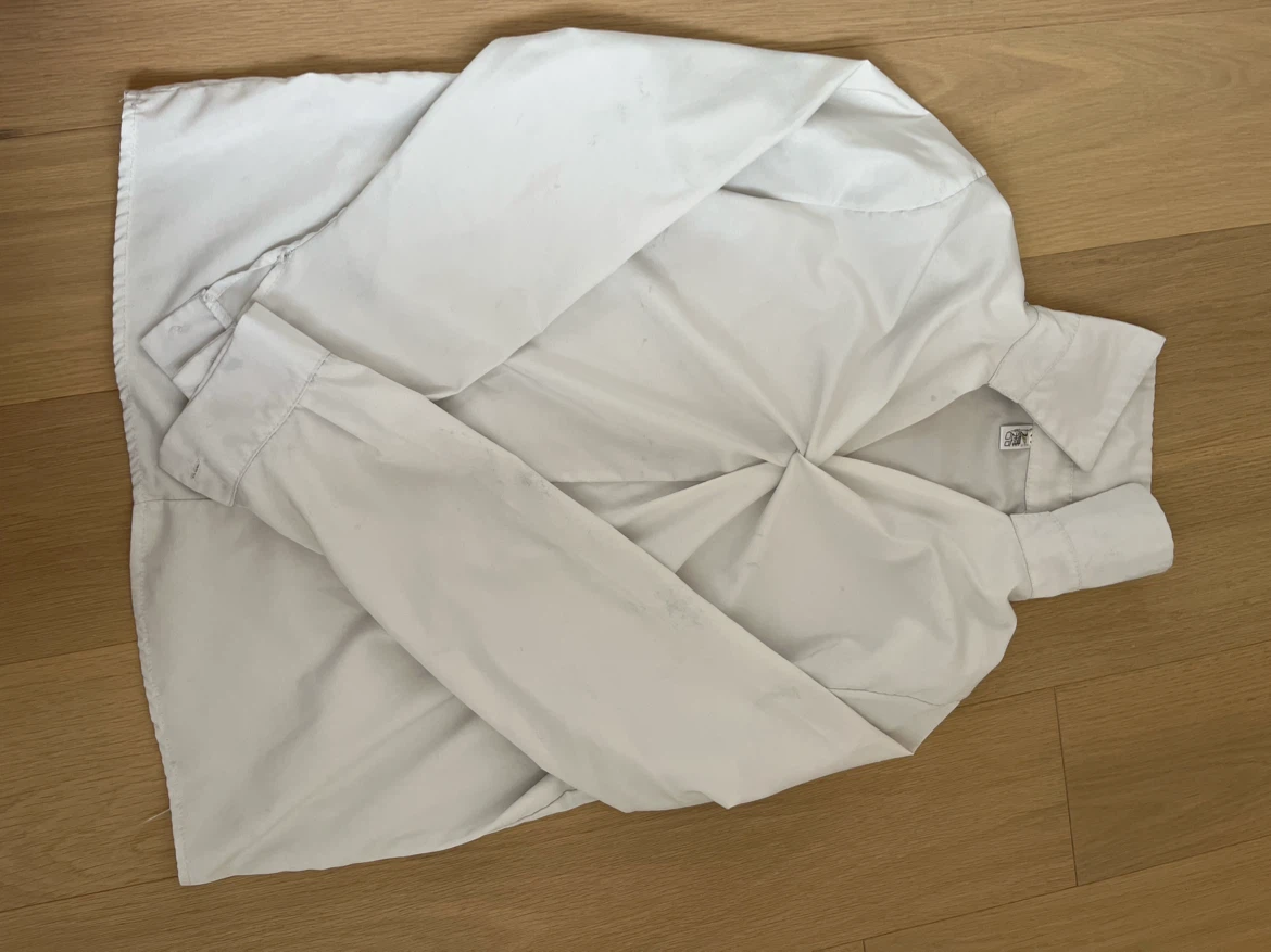 White long-sleeve twist front shirt 🏈