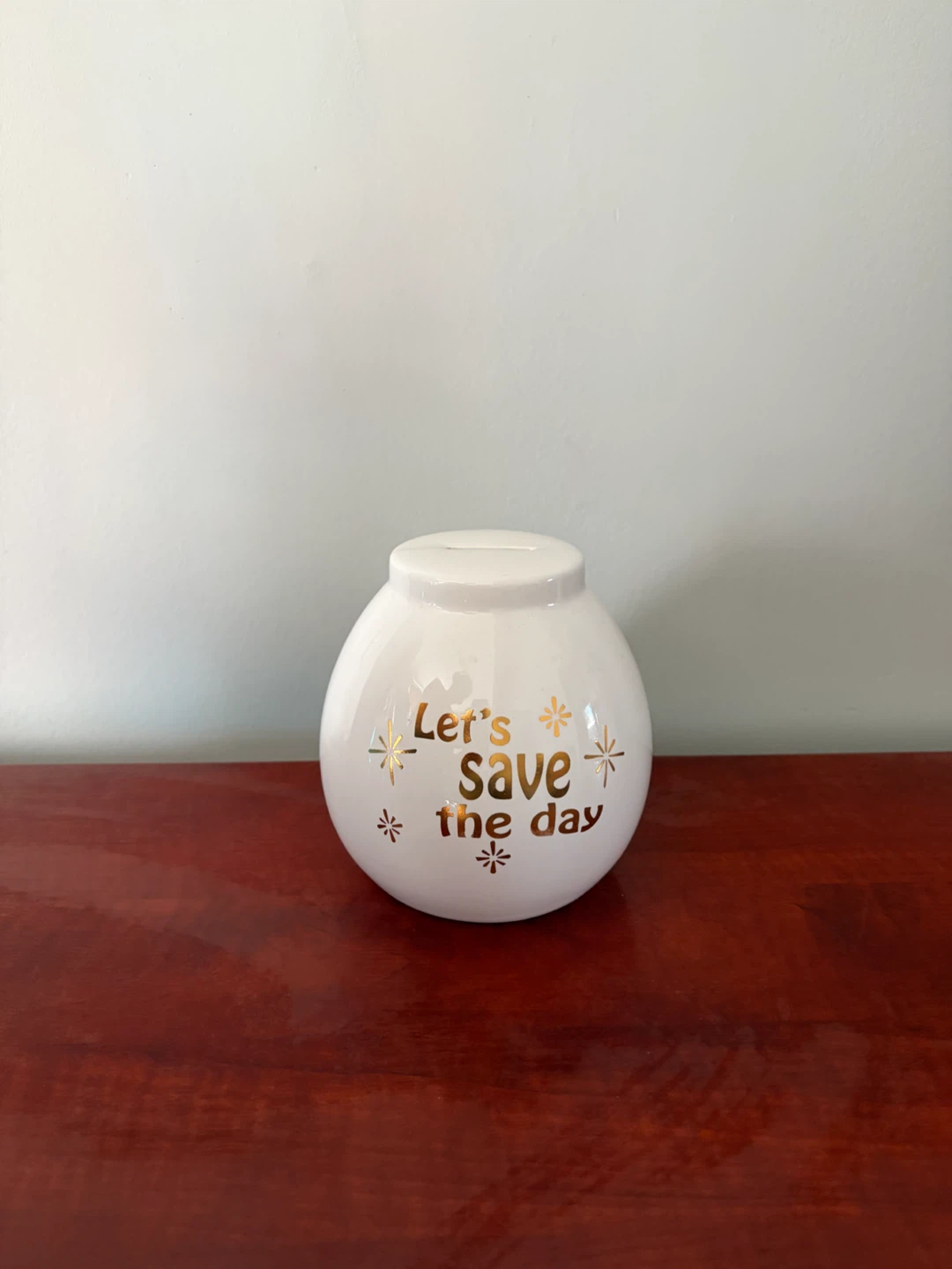White Let's Save the Day Ceramic Coin Bank
