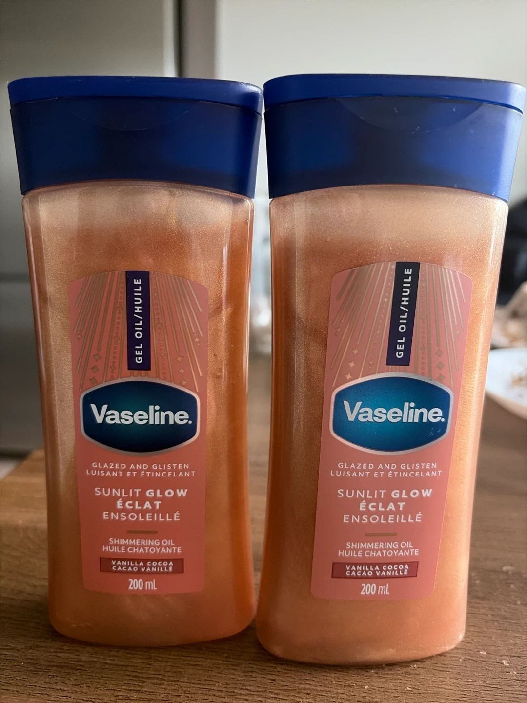 2 Vaseline Sunlit Glow Shimmering Oils