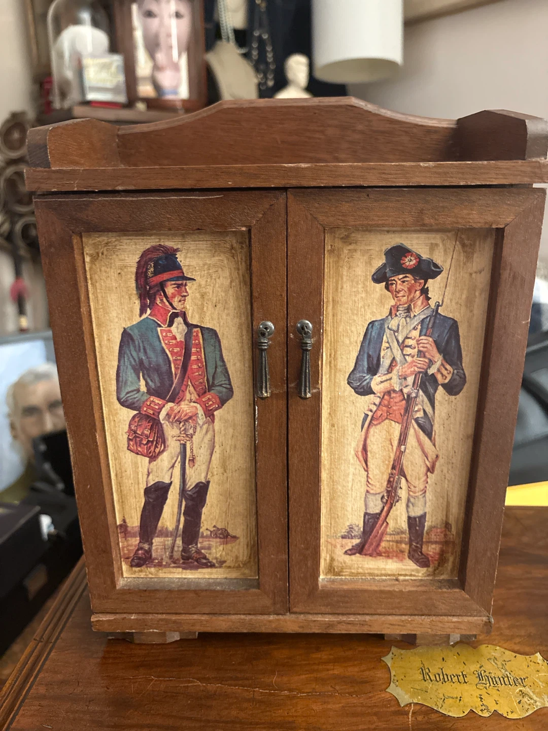 🏈 Vintage Wooden Cabinet with Military Illustrations