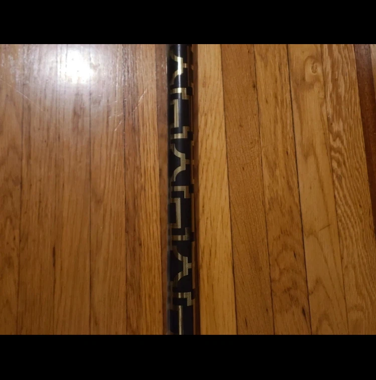 Decorative Black and Gold Patterned Pole🏈