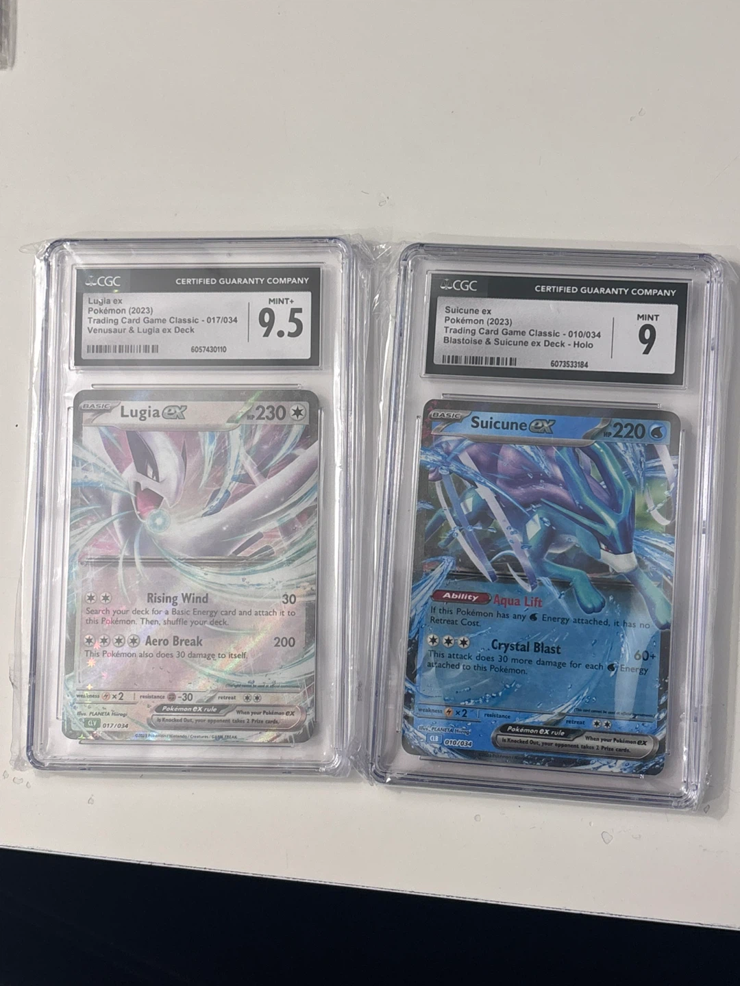 CGC Graded Lugia ex 9.5 and Suicune ex 9 Pokemon Cards