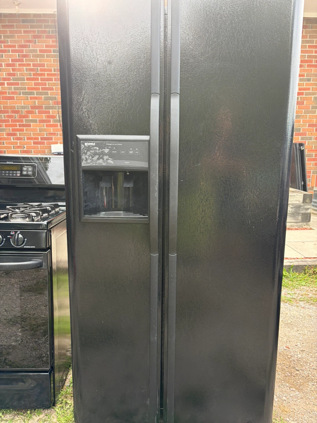 Kenmore Side-by-Side Refrigerator & GE Profile Gas Stove