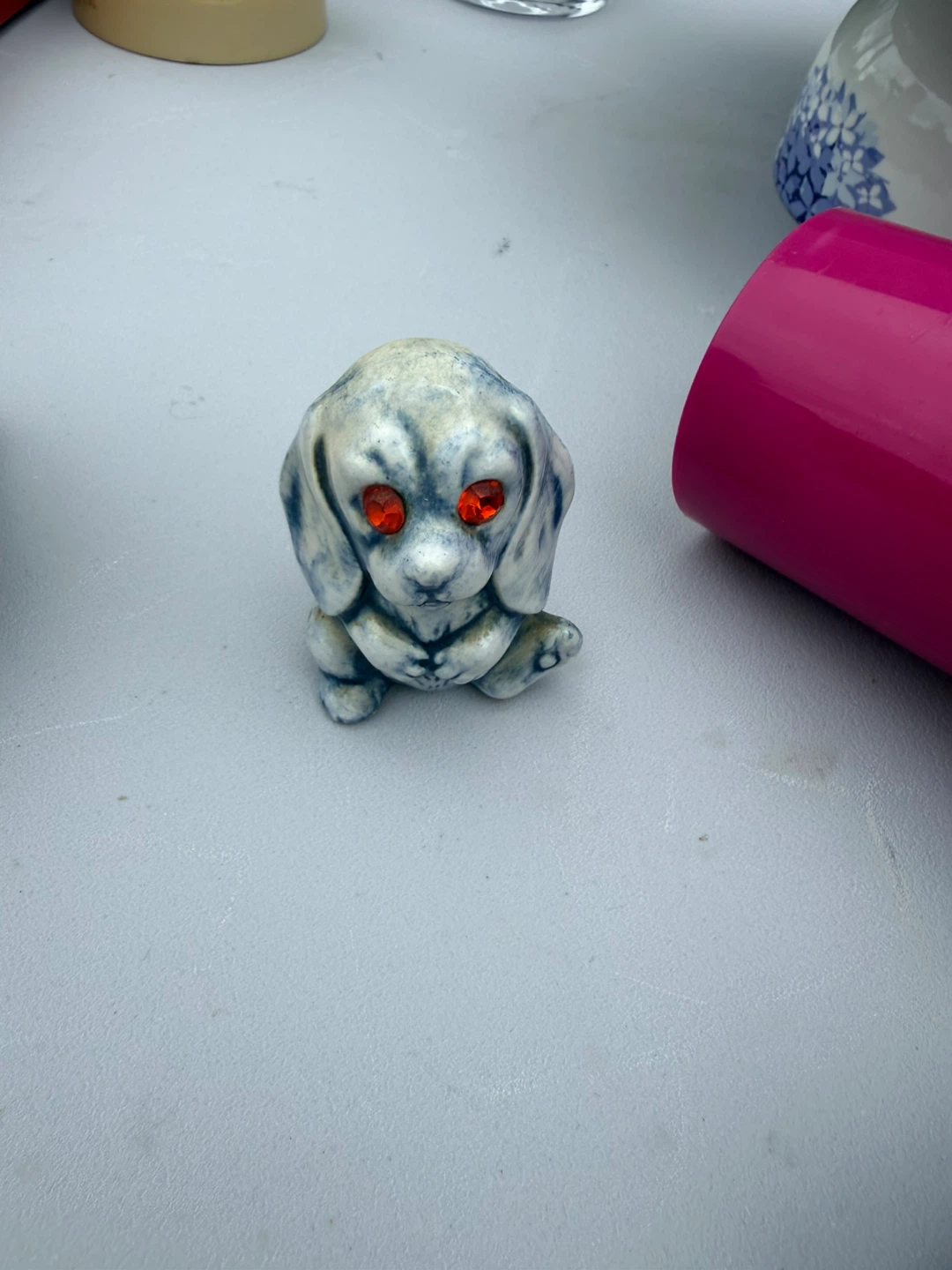 Ceramic Dog Figurine with Red Gem Eyes