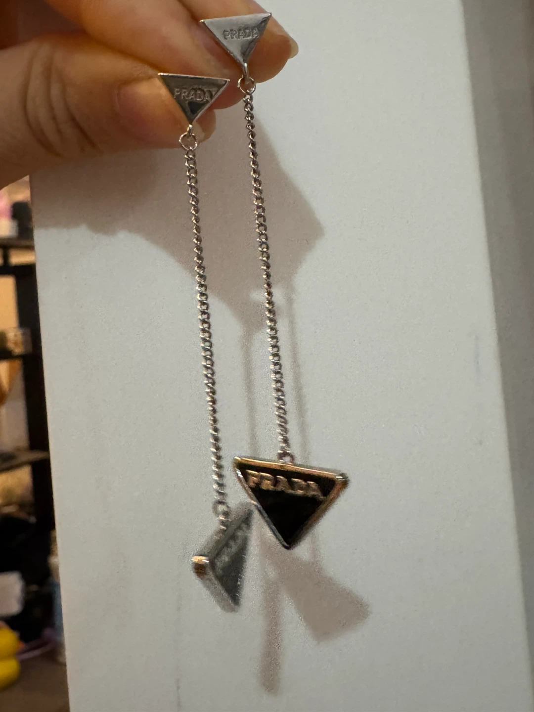 Prada triangle logo drop earrings