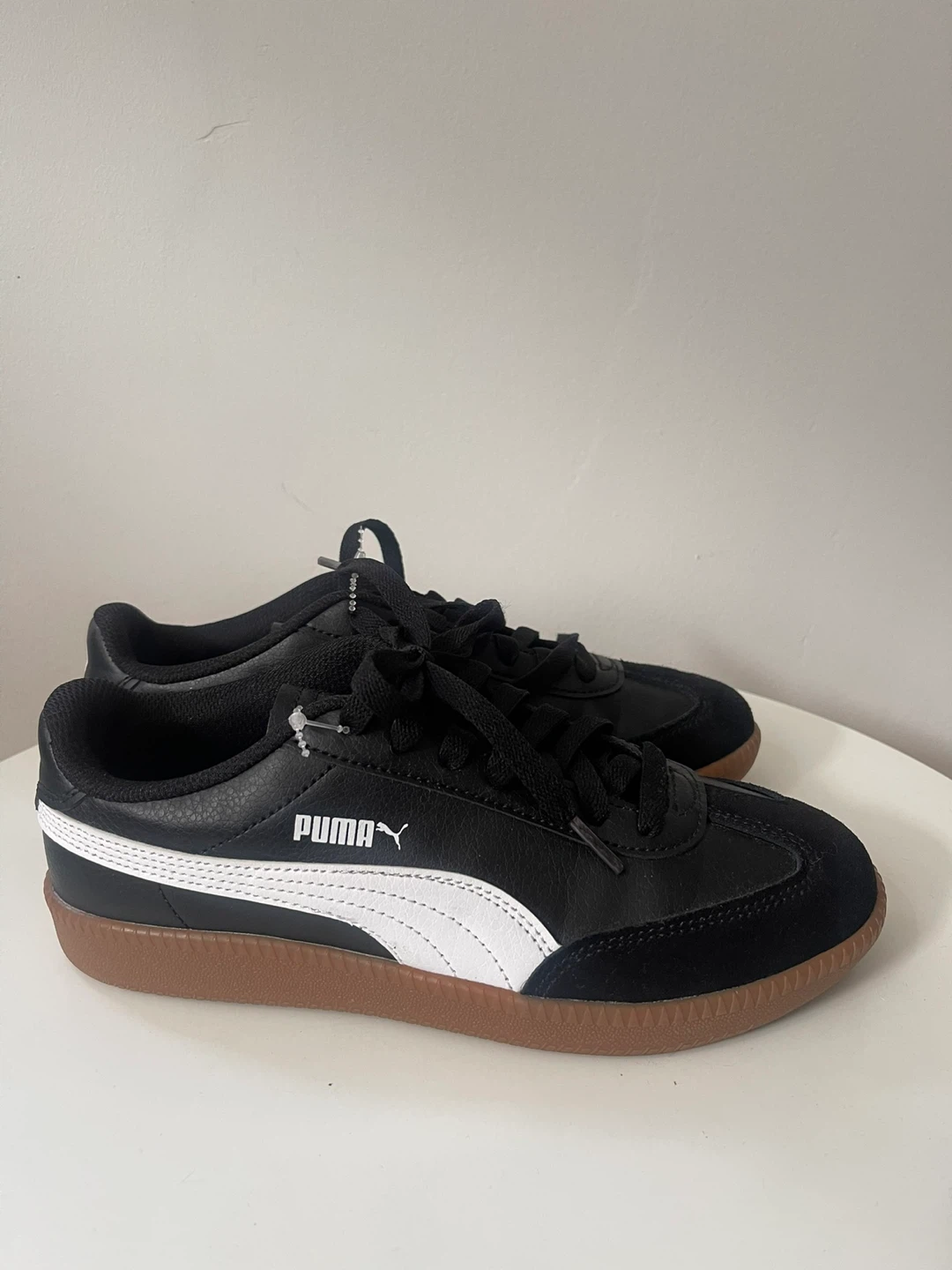 Puma Black and White Sneakers