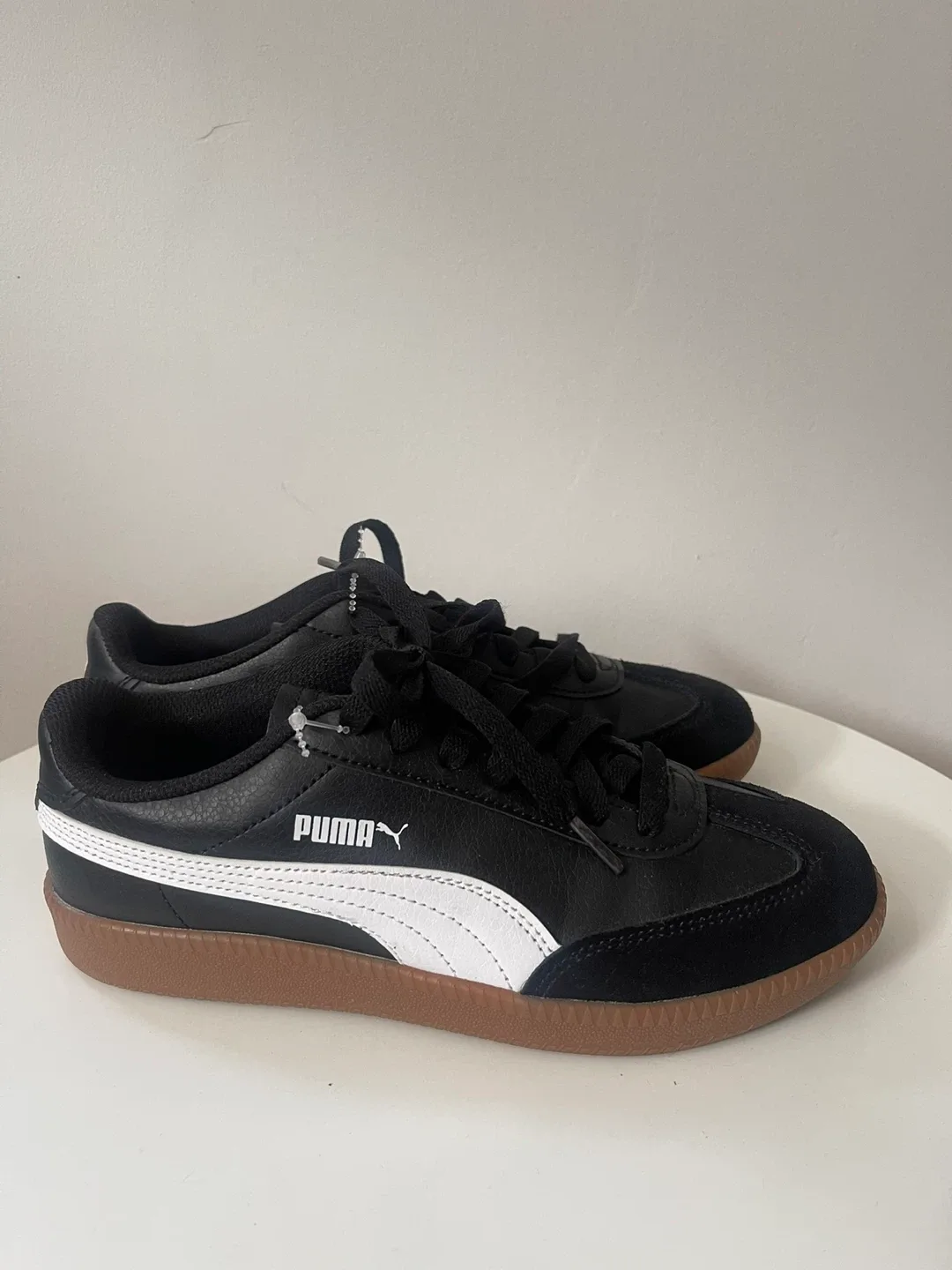 Puma Black and White Sneakers