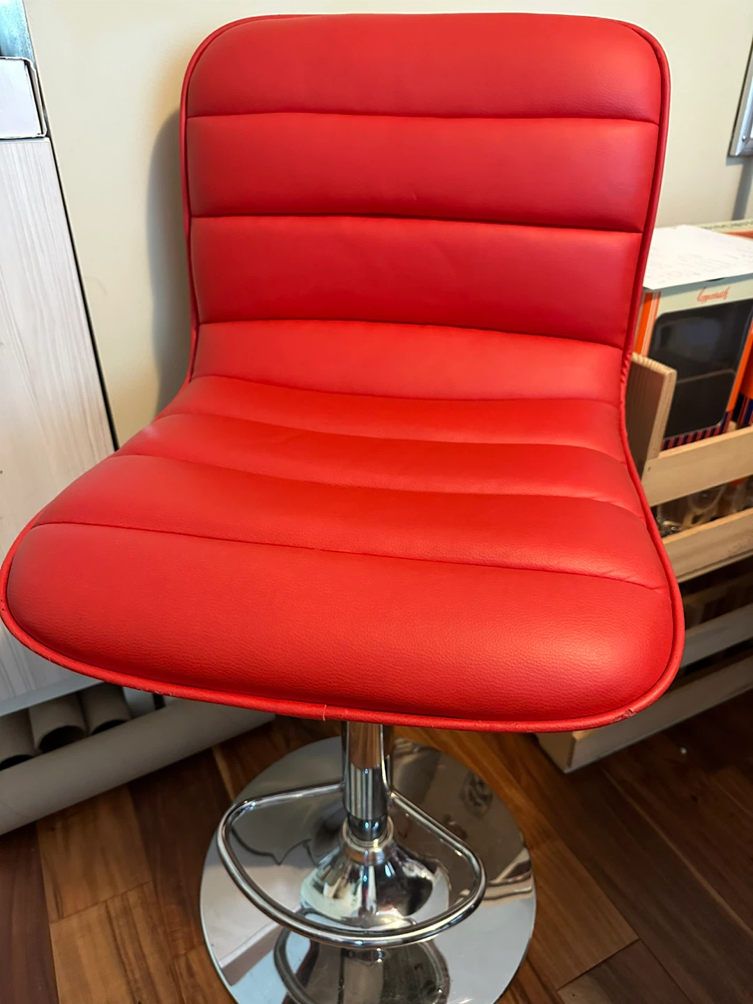 Red adjustable swivel bar stool