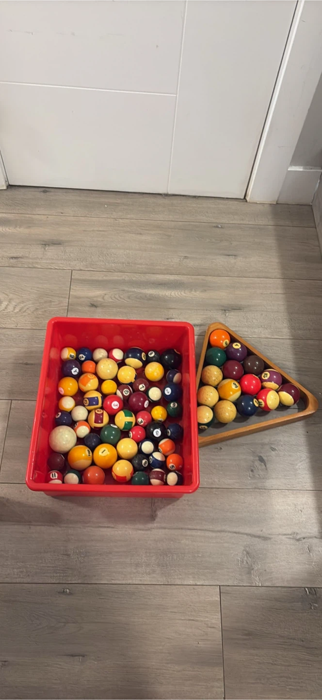 Large collection of assorted billiard balls with tray
