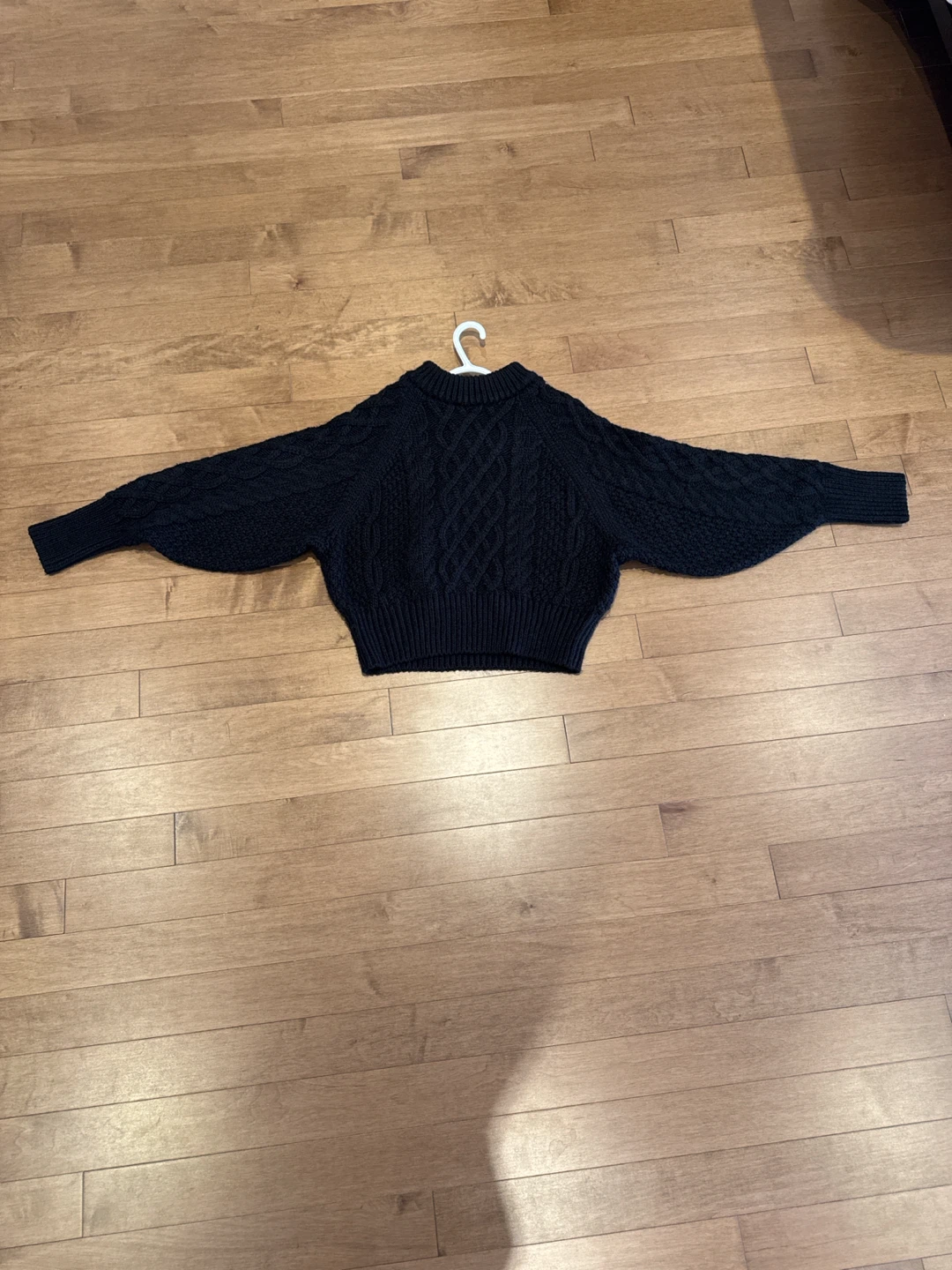 Black cable knit sweater