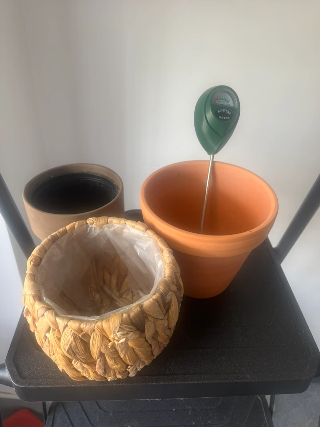 Set of three plant pots with soil moisture meter