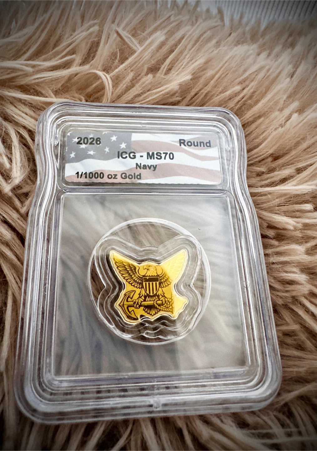 2026 ICG MS70 Navy 1/1000 oz Gold Round