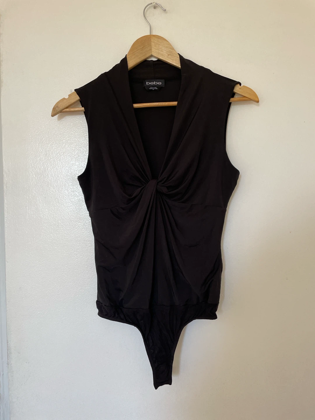 bebe Sleeveless Twist-Front Bodysuit - Black