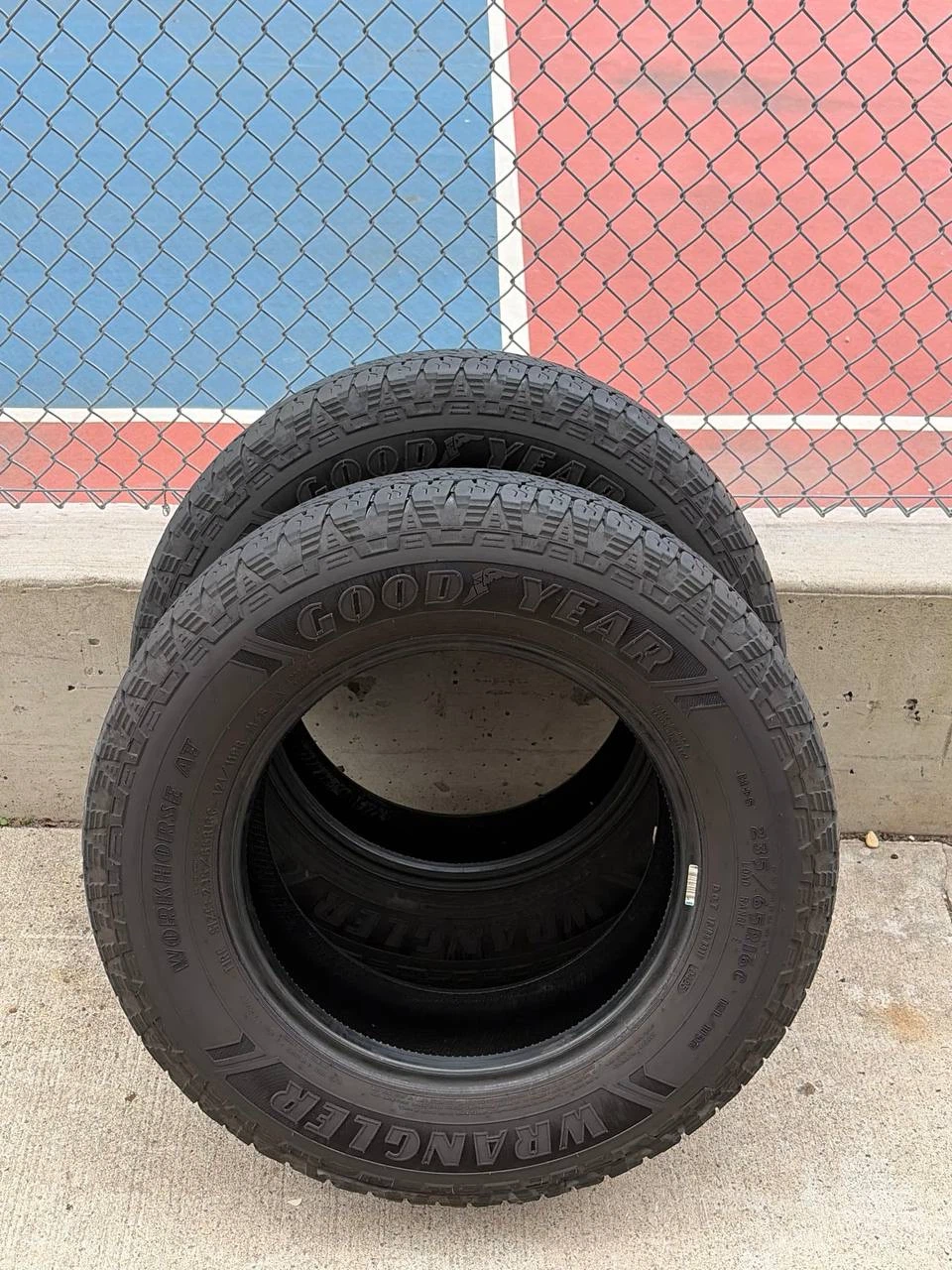 Pair of 2025 235/65R16 Goodyear Wrangler Workhorse winter tires