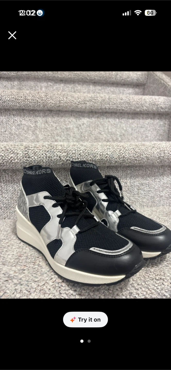 Brand new Michael Kors Black and Silver Sneakers