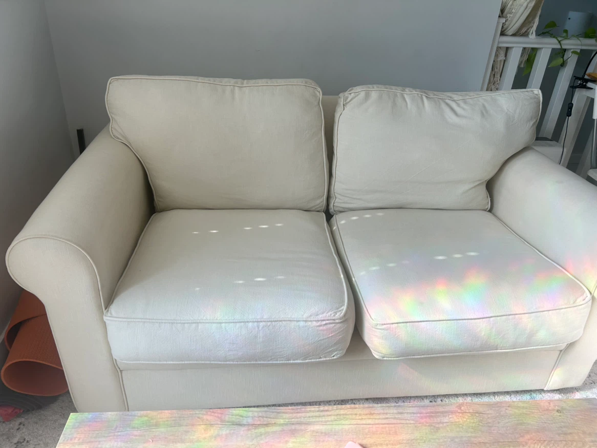 Cream coloured two-seater sofa - photo 2