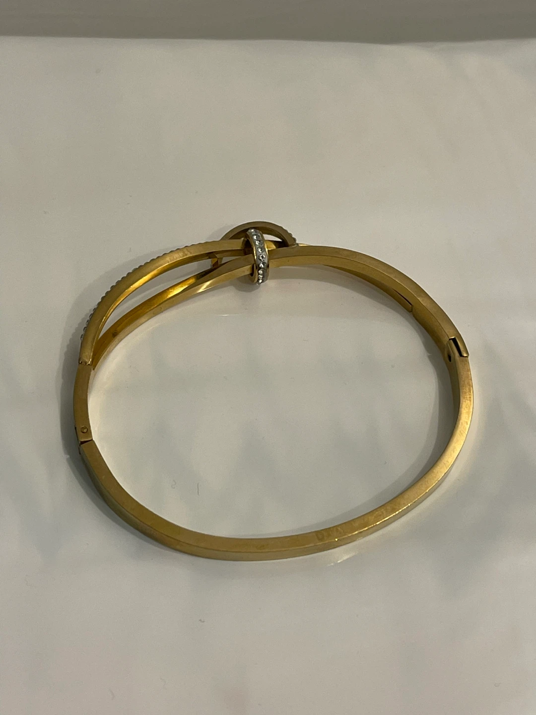 Gold-tone knot bracelet with crystals - photo 3