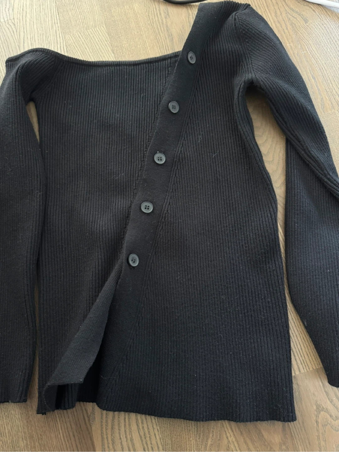 Designer’s Asymmetrical Button-Up Top