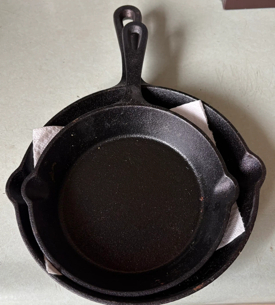 Two Cast Iron Skillets