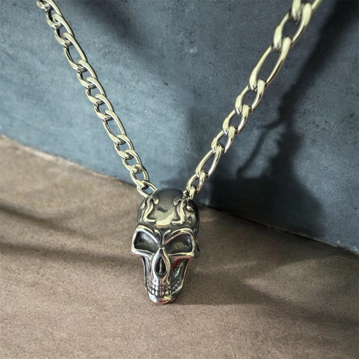Silver-toned skull pendant necklace