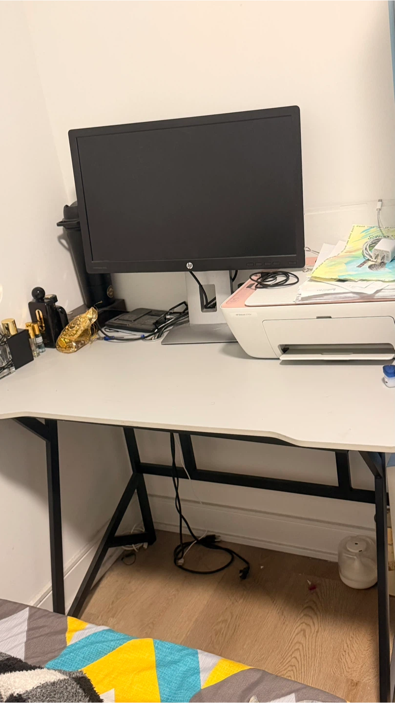 White modern desk with black metal frame