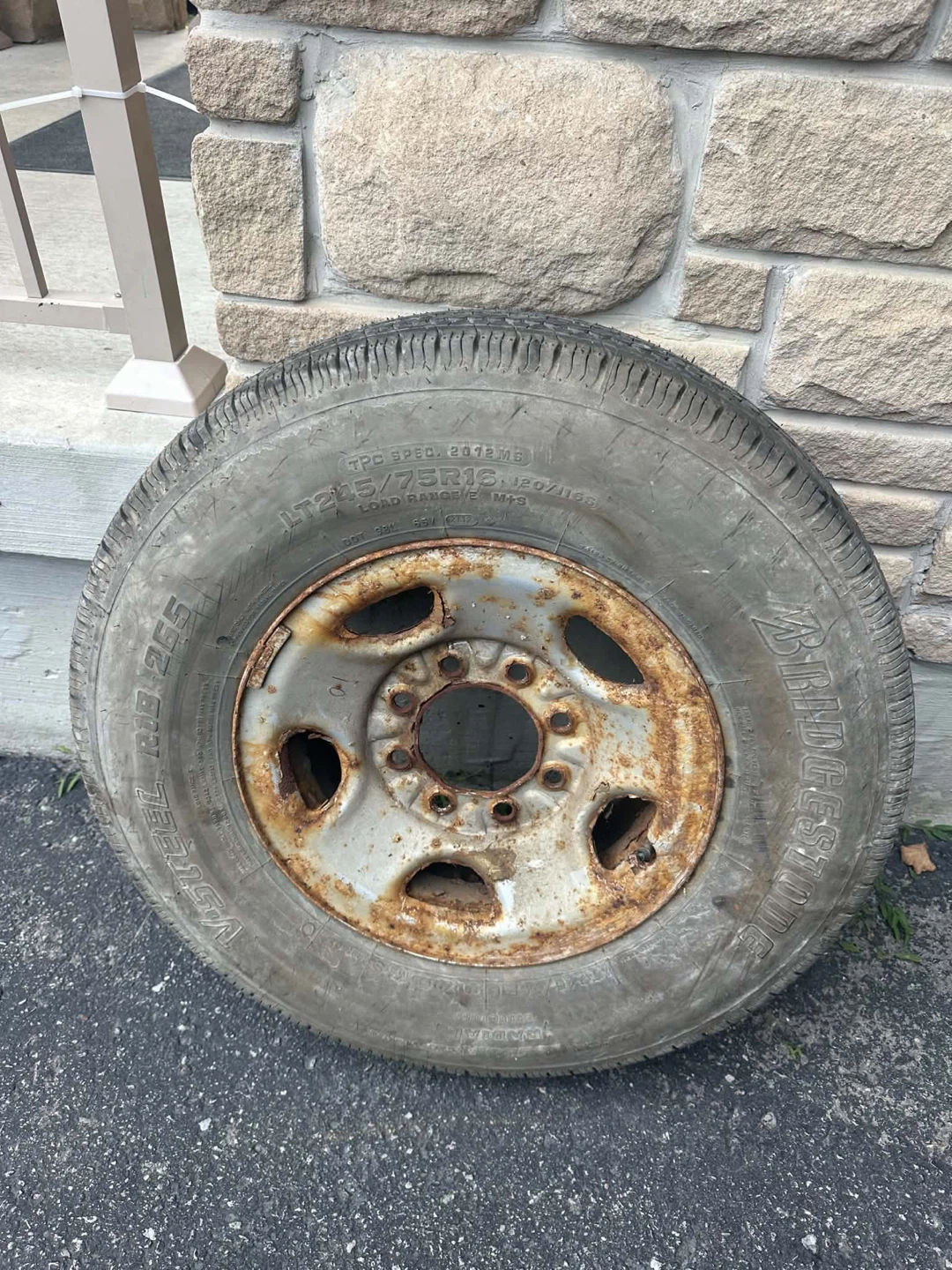 Bridgestone V-Steel Rib 265 Tire with Steel Rim