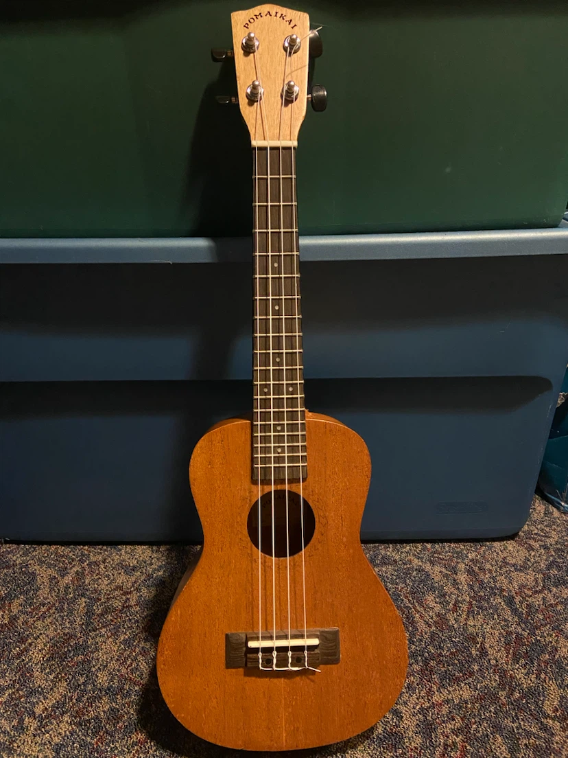 Damaged Pomaikai Ukulele with Case