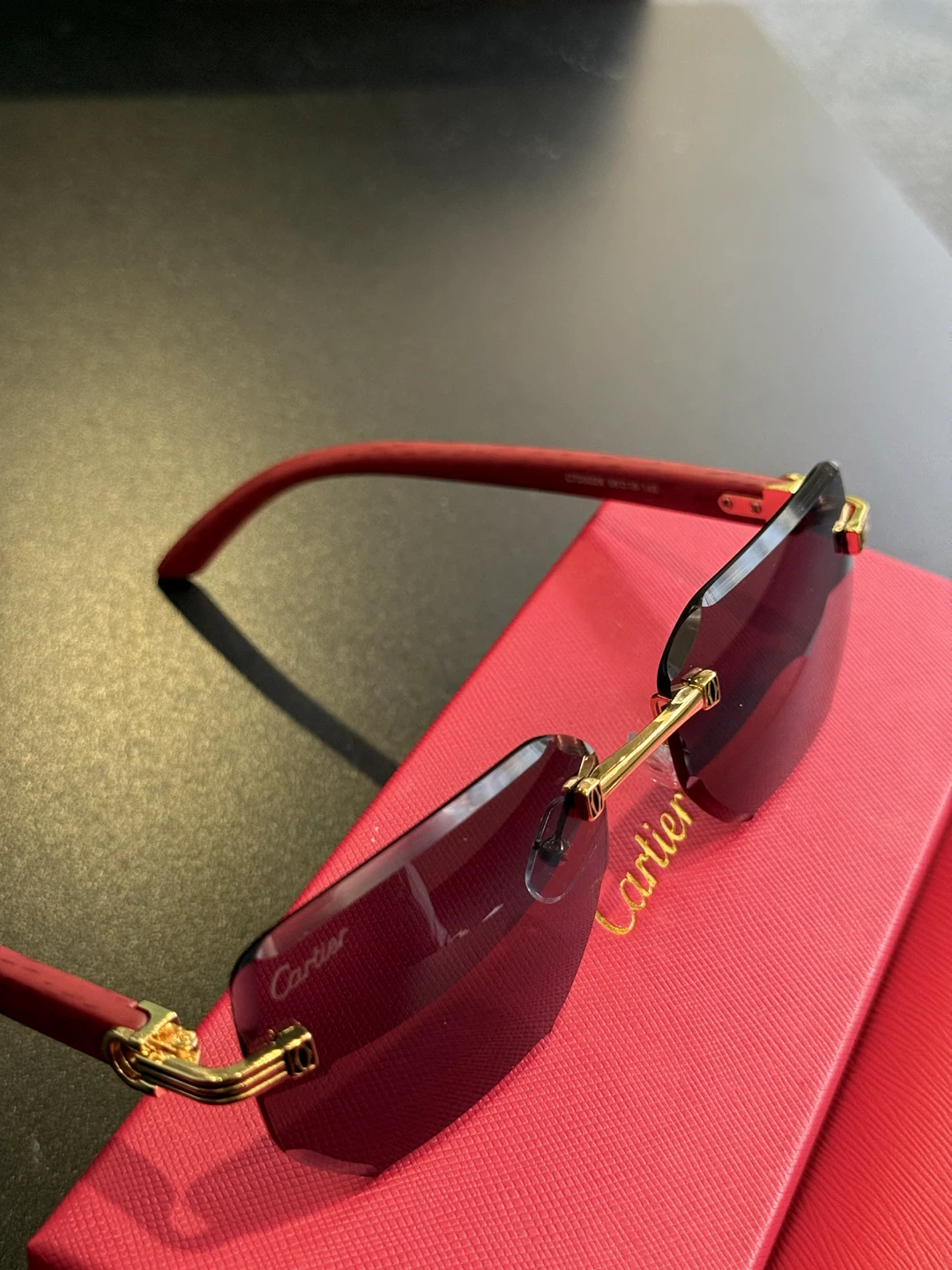 Cartier rimless sunglasses with red wood-finish temples - photo 5