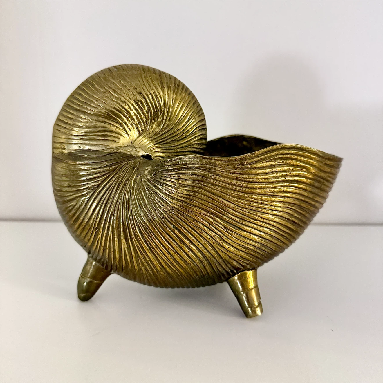 Vintage MCM solid brass nautilus shell