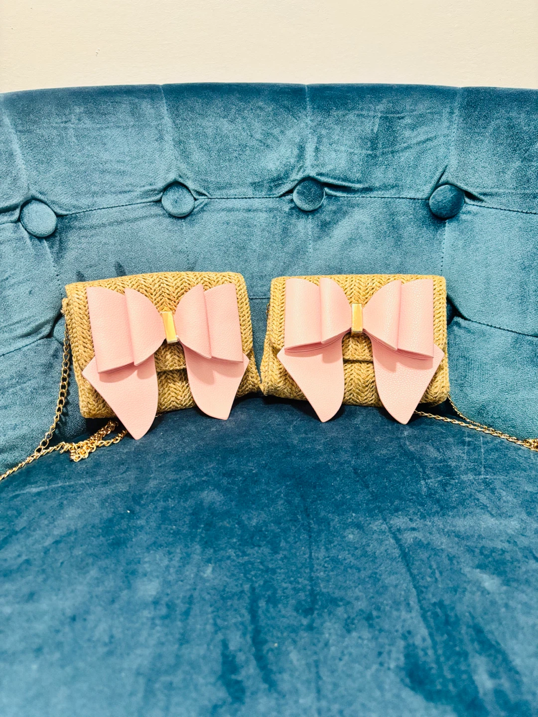 Two Woven Straw Crossbody Bags with Pink Bows