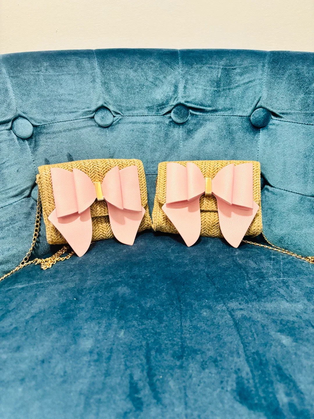 Two Woven Straw Crossbody Bags with Pink Bows