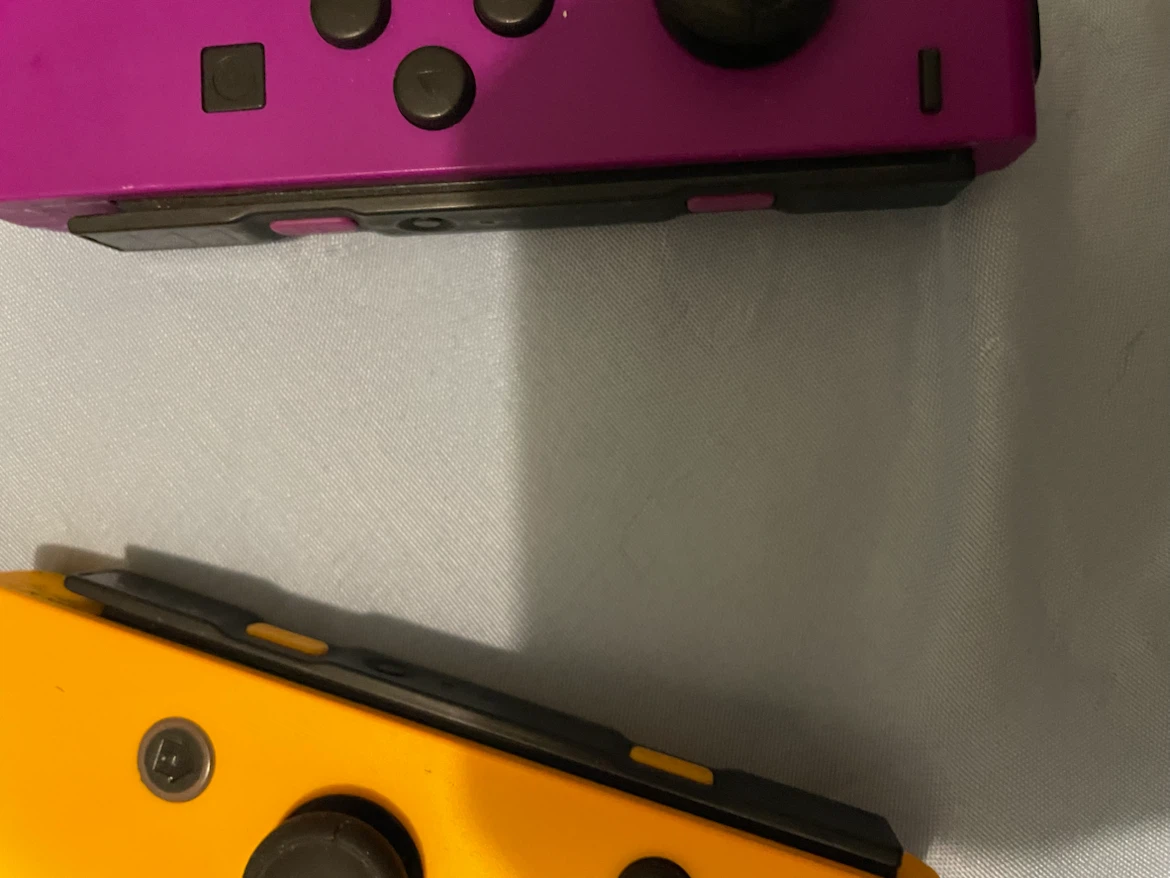 Nintendo Switch Joy-Con Controllers Purple and Orange - photo 2