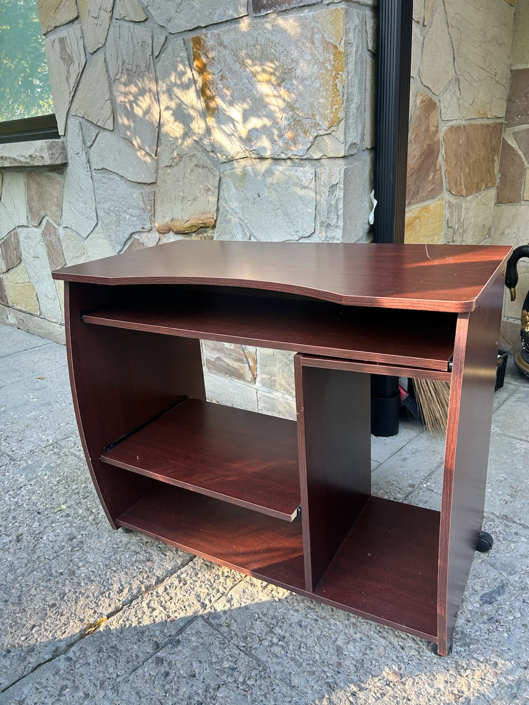 Rolling dark cherry wood computer desk
