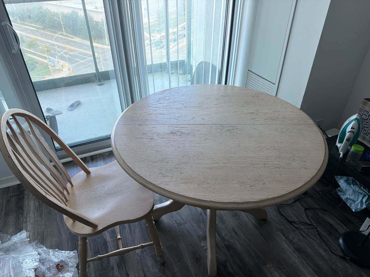 Round wooden dining table with one matching chair - photo 2