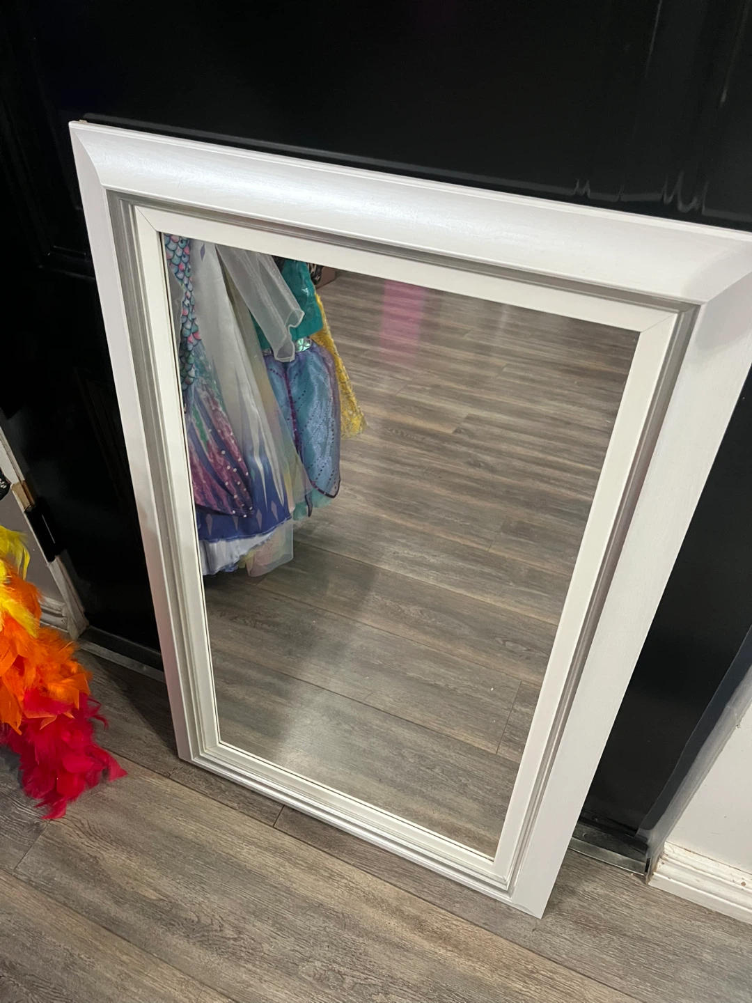 White framed wall mirror