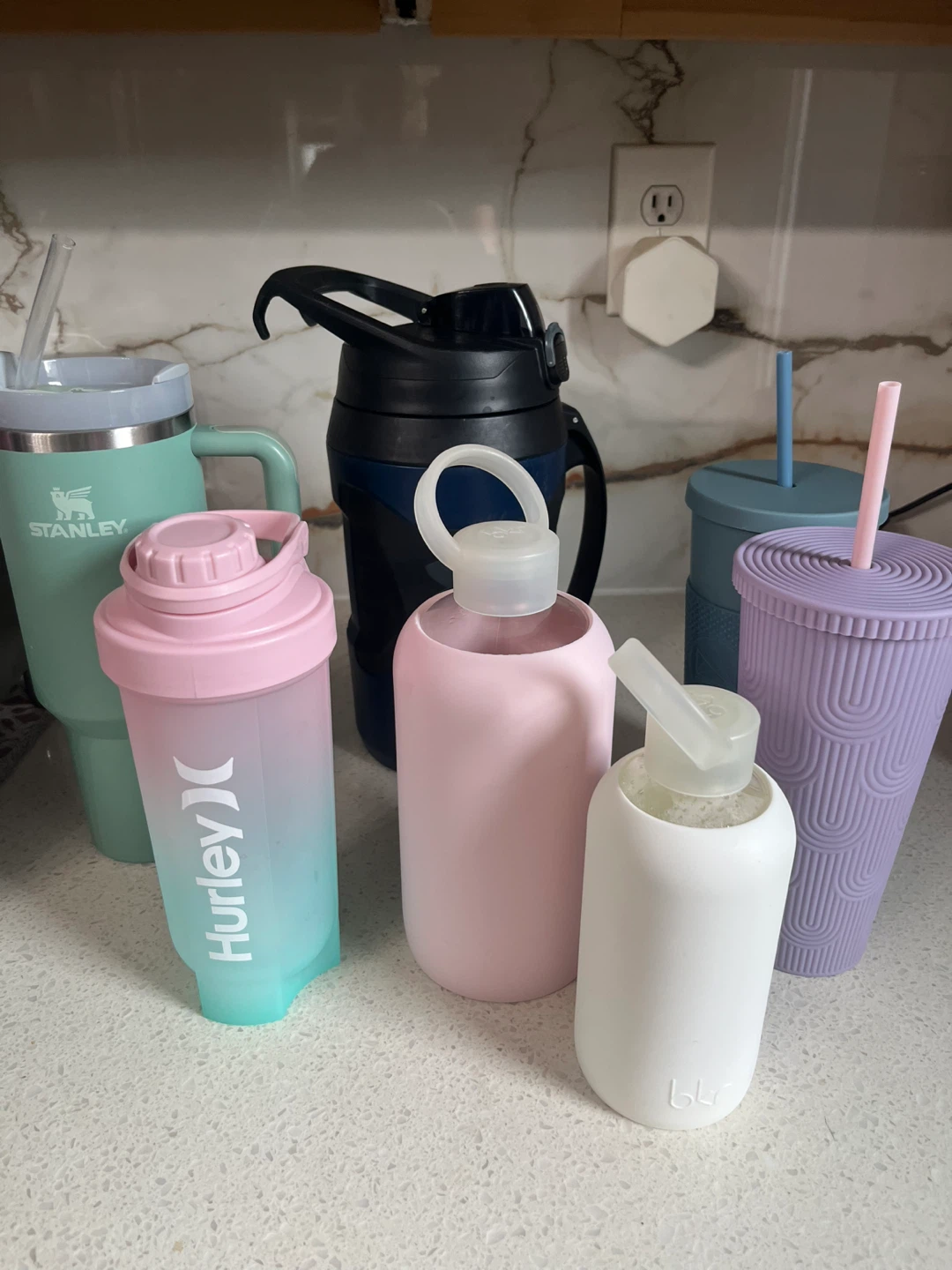 Assorted Reusable Water Bottles and Tumblers