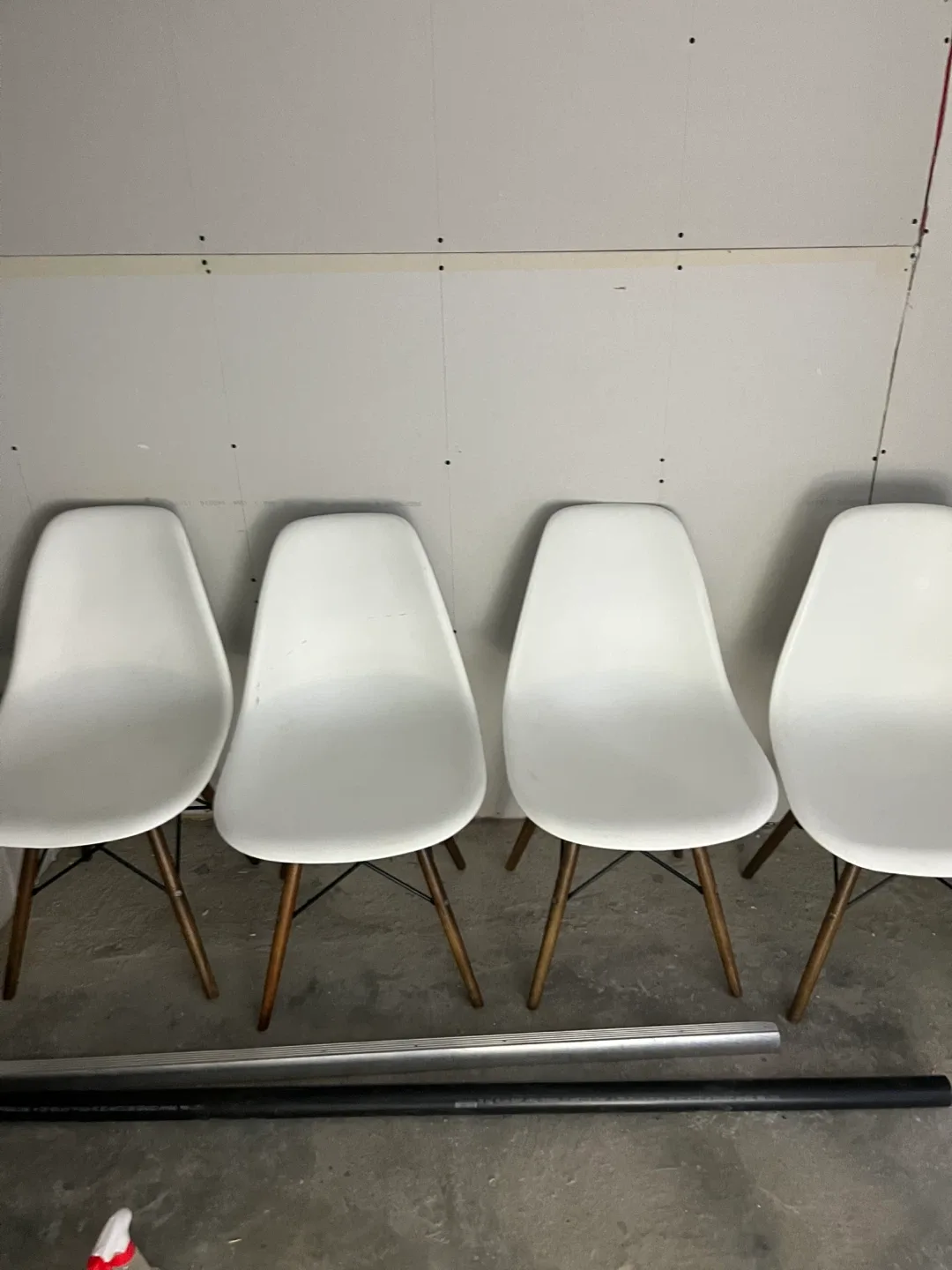 Set of 4 white Eames style dining chairs