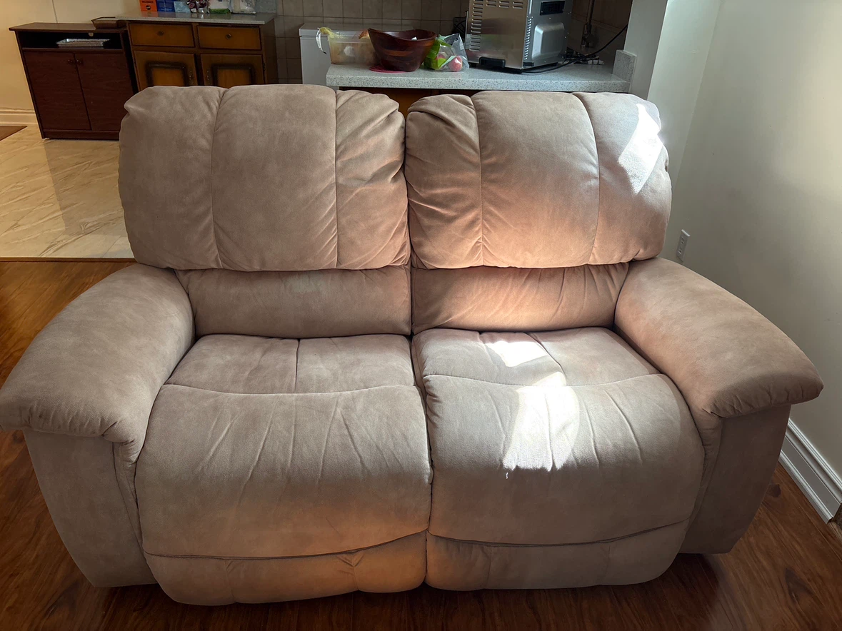 Beige Reclining Loveseat