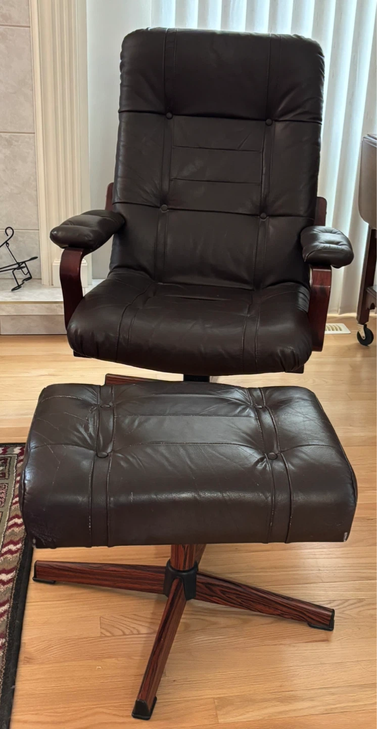 Brown leather arm chair w/ footstool