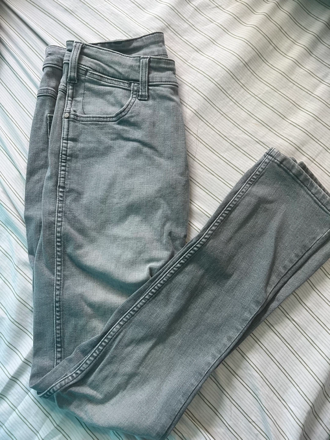 Acid wash distressed denim jeans