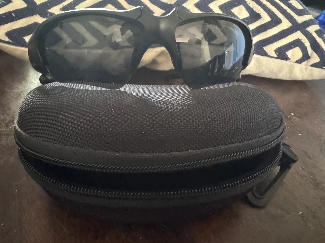 Black wrap sunglasses with hardshell carrying case