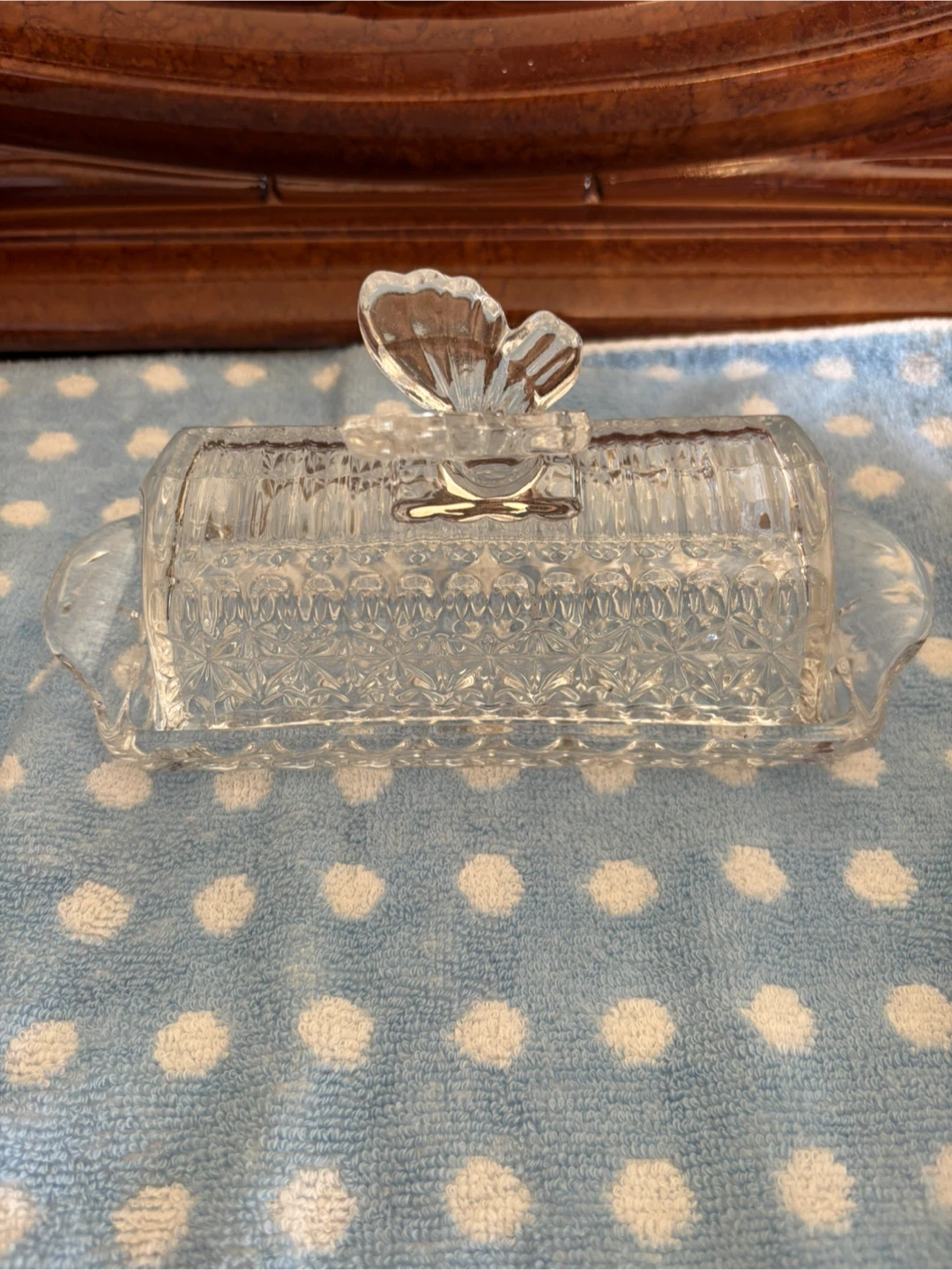 Glass butter dish with butterfly handle