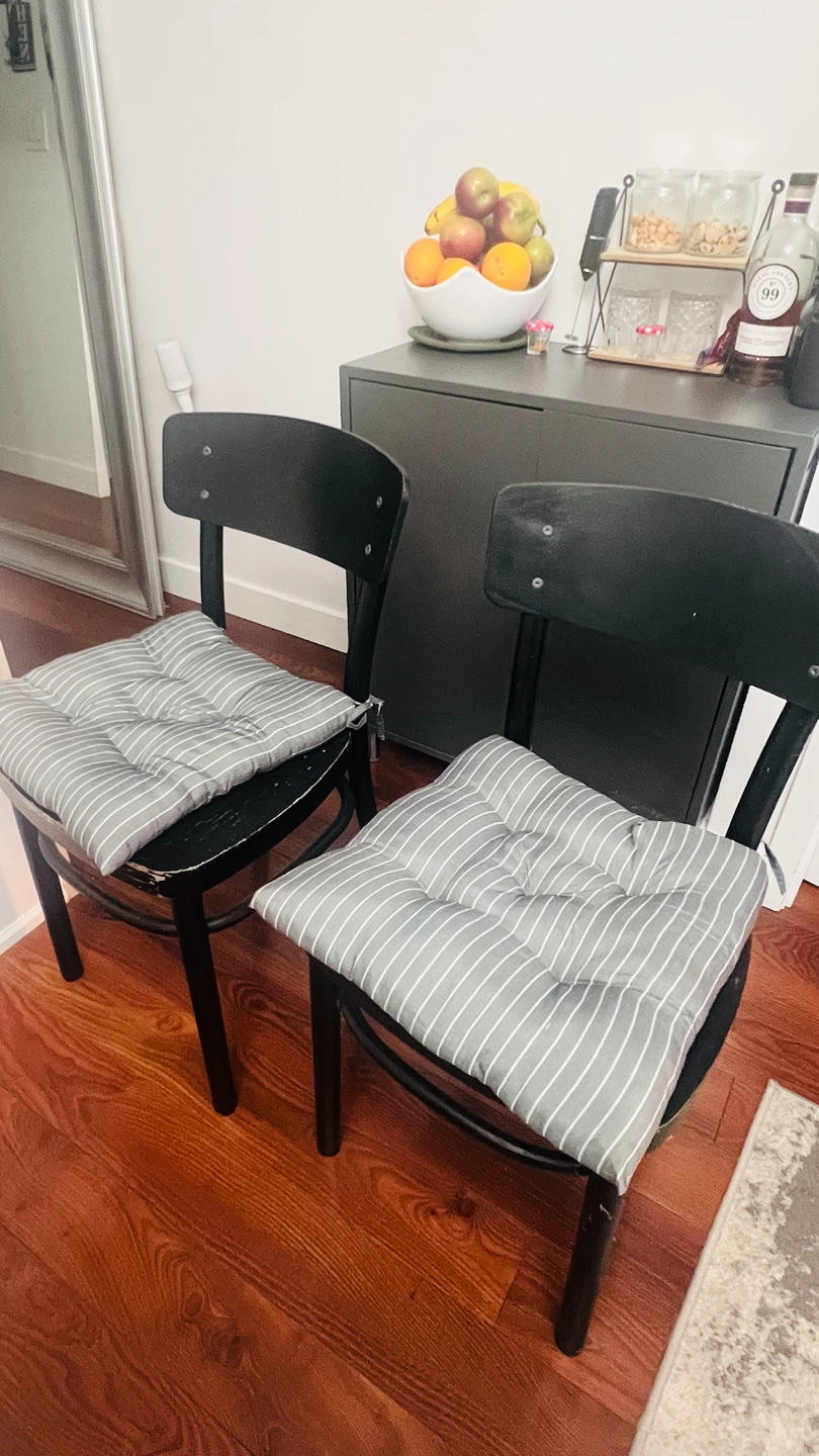 Two Black Wooden Chairs