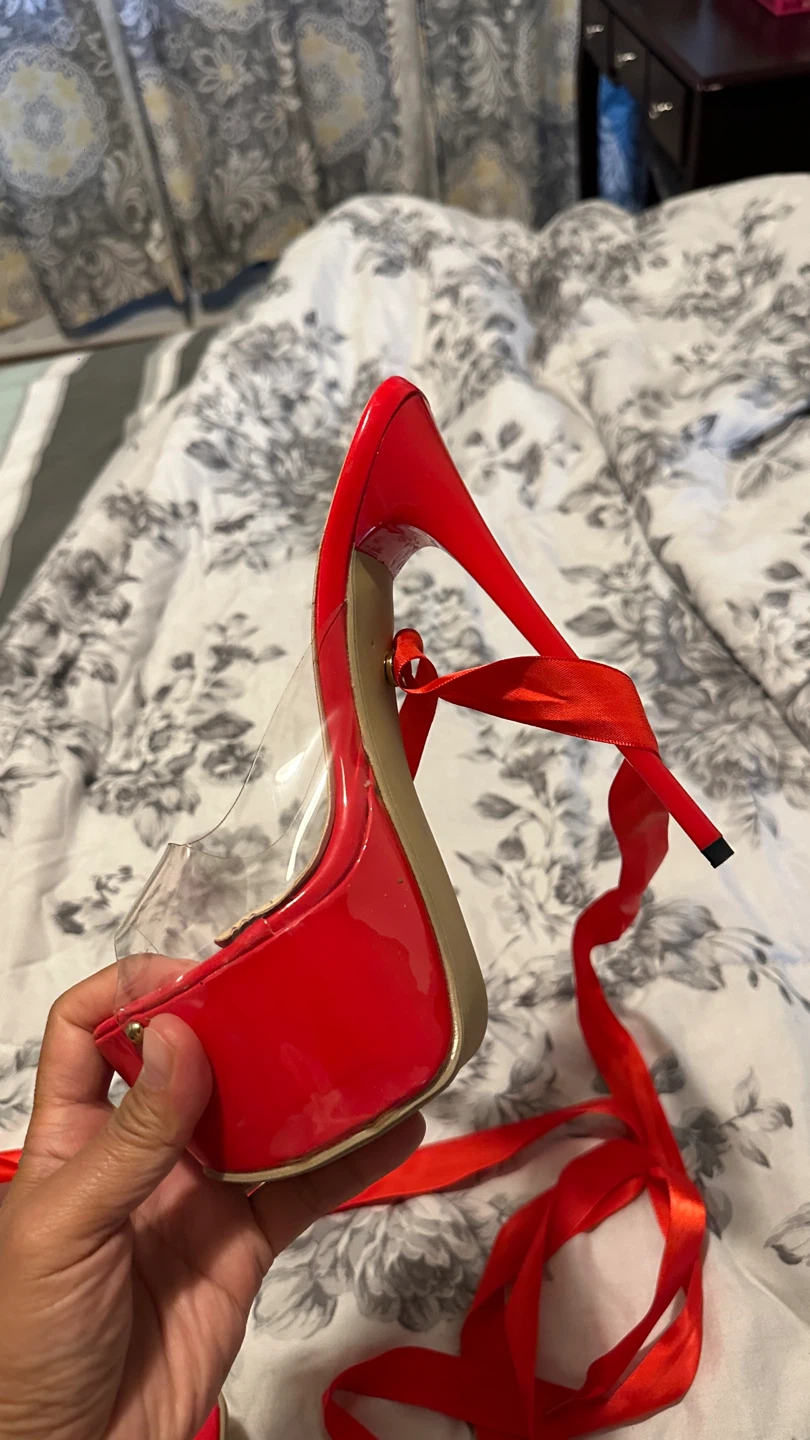 Red platform stiletto heels with ribbon