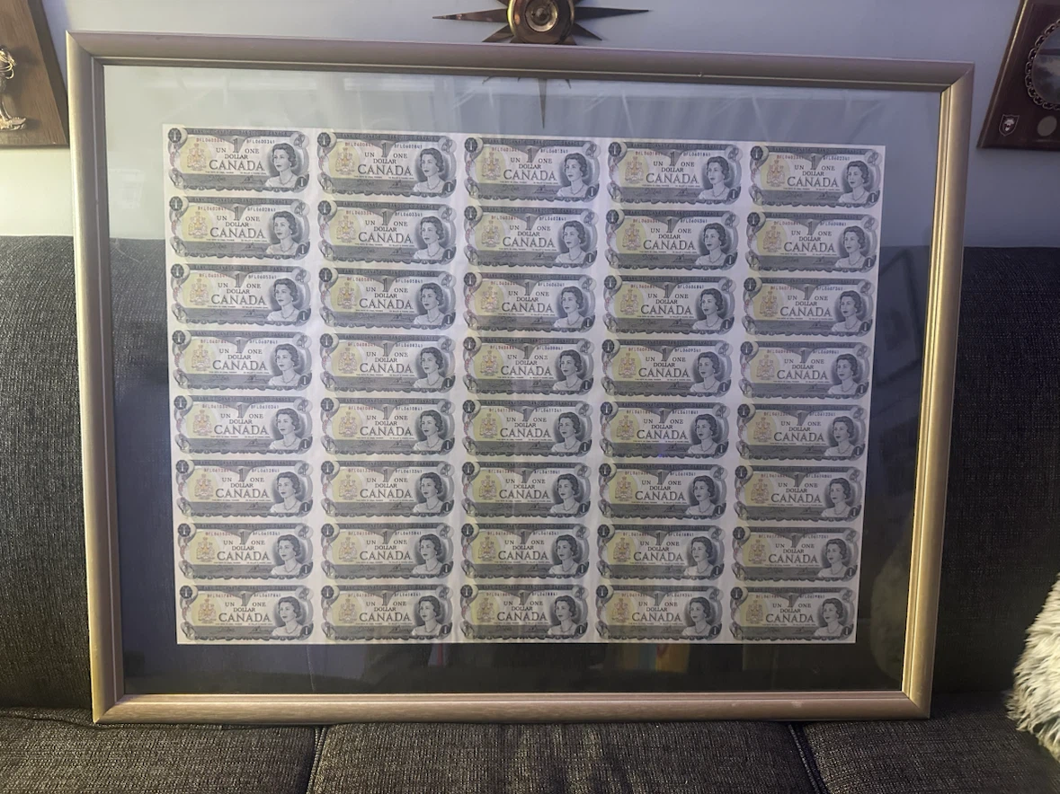 Framed Sheet of Canadian $1 Bills