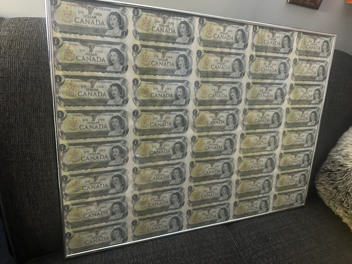 Framed Sheet of Canadian $1 Bills