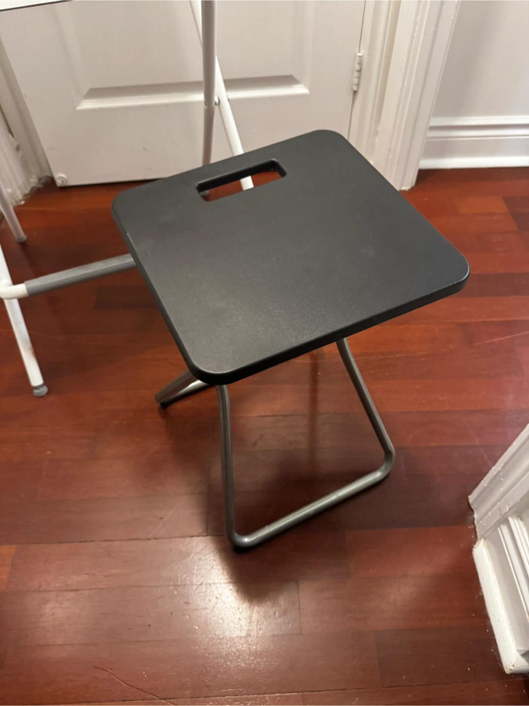 IKEA folding chair and small black stool - photo 4